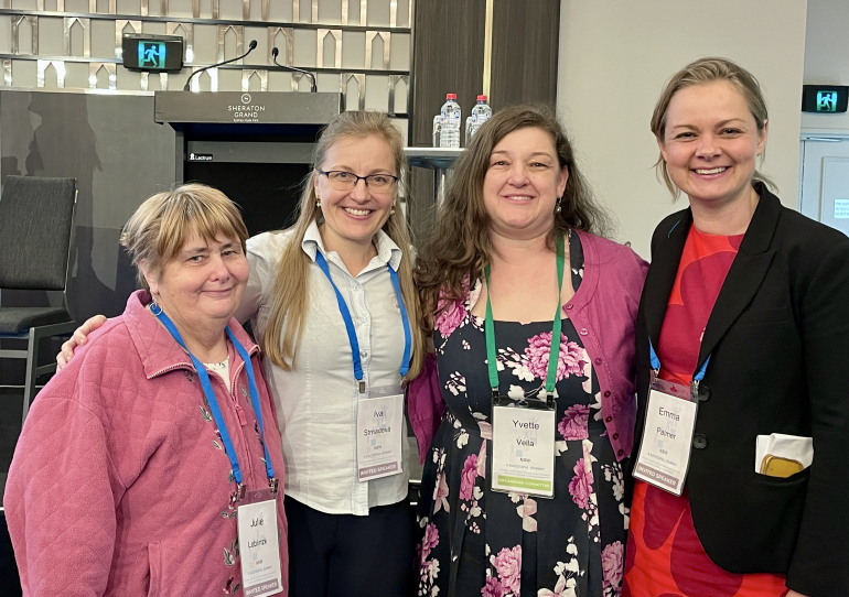 Julie Loblinzk, Iva Strnadova, Yvette Vella and Emma Palmer at the NBPSA Conference, smiling for the camera