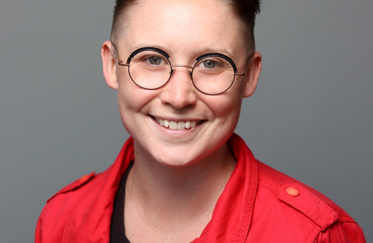 A woman, Alice Bennet, smiles for the camera