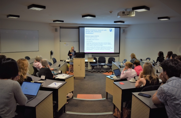 A group of people in a lecture theatre