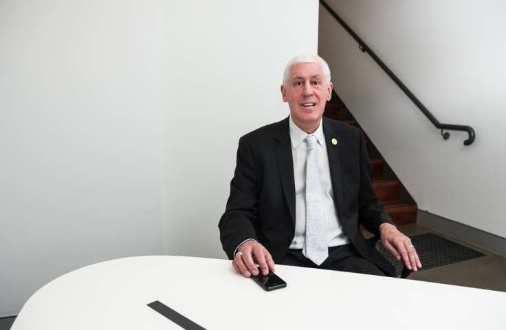 A man is sitting at a table