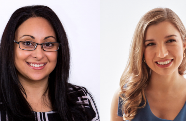 A woman wearing glasses and a woman smiling for the camera