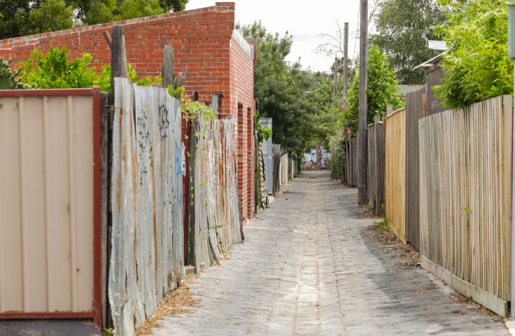 an empty back urban laneway in daytime